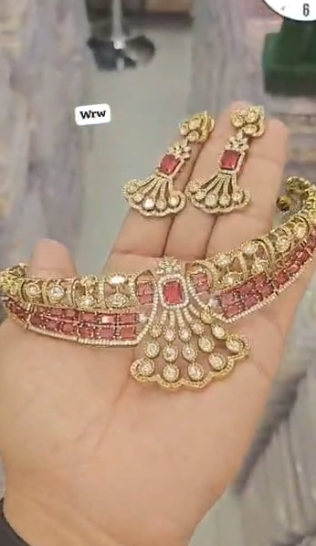 Diamond necklace set featuring gem stones