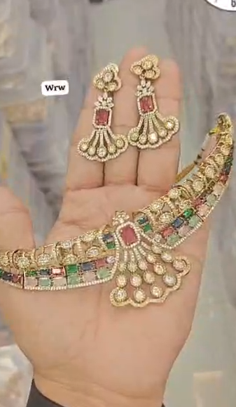 Diamond necklace set featuring gem stones