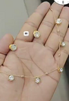 Gold-plated station necklace featuring multiple round, bezel-set simulated diamond