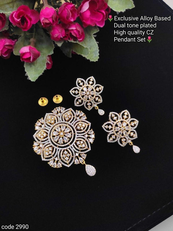 diamond pendant set with matching earrings