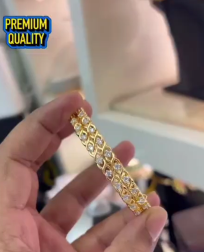 Diamond studded gold plated bangle
