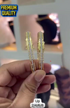 Openable gold-plated bangles studded with white CZ diamonds.