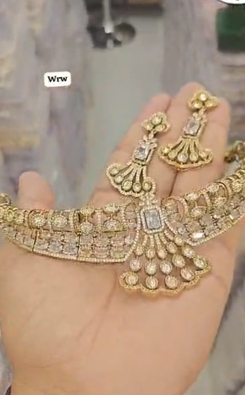 Diamond necklace set featuring gem stones