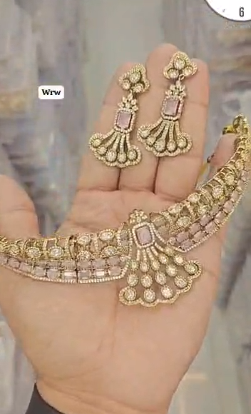 Diamond necklace set featuring gem stones