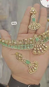 Diamond necklace set featuring gem stones