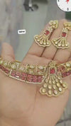 Diamond necklace set featuring gem stones