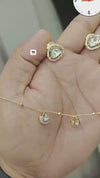 Gold-plated necklace and matching earring set adorned with moissanite stones
