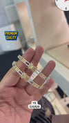 Gold-plated bangle-style bracelets