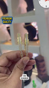 Openable gold-plated bangles studded with white CZ diamonds.